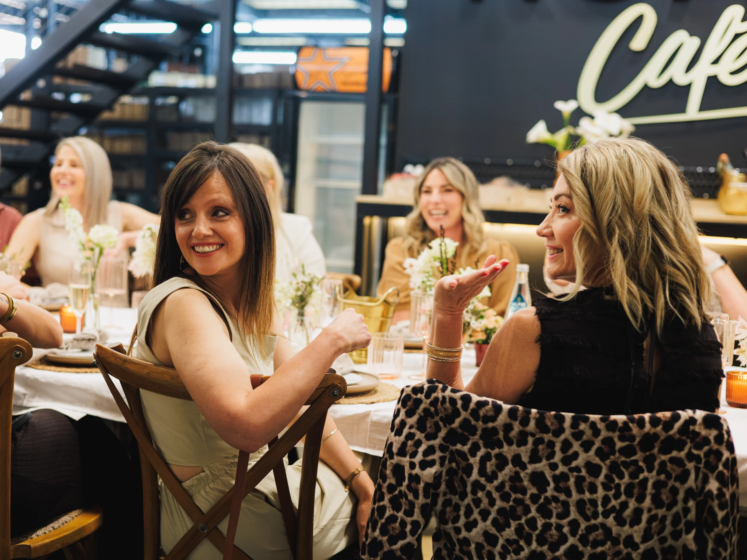 Friends gathering around a table